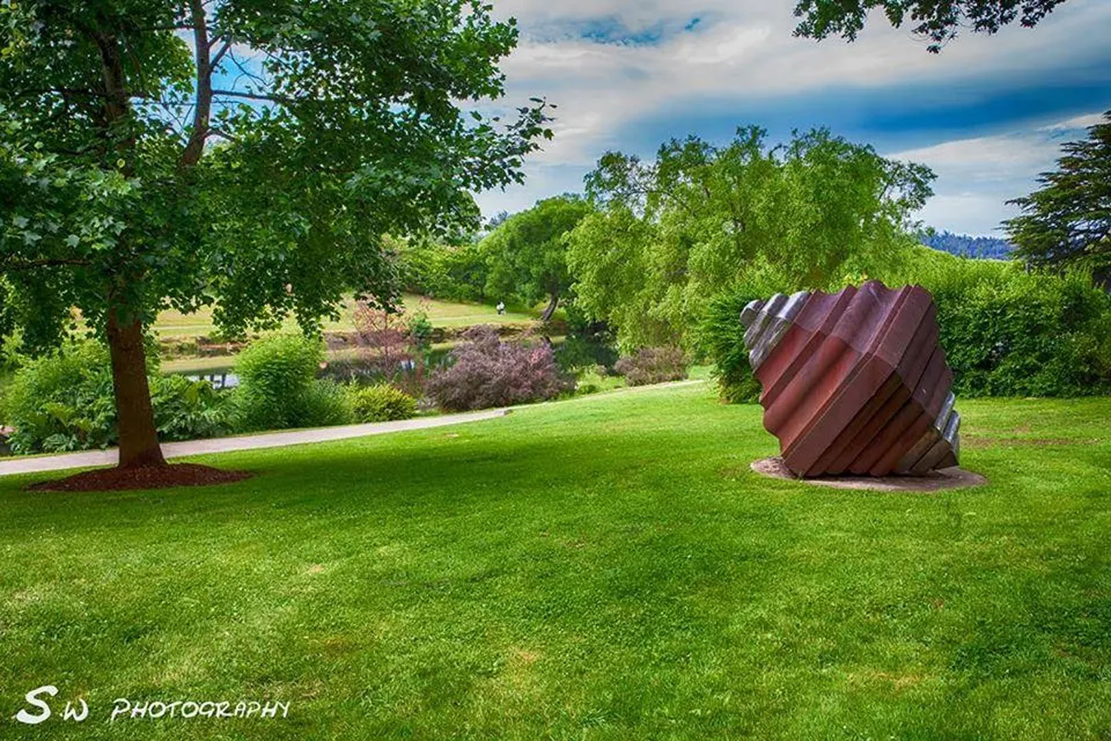 Large nut sculpture installed in landscaped grounds in Deloraine Tasmania